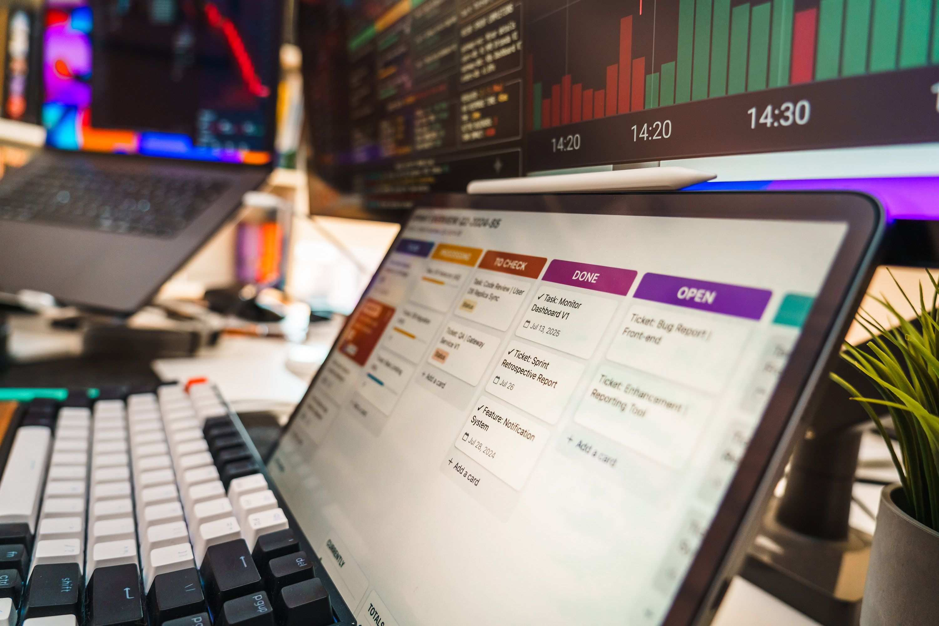 Computer screen showing source code on a desk in an office setting